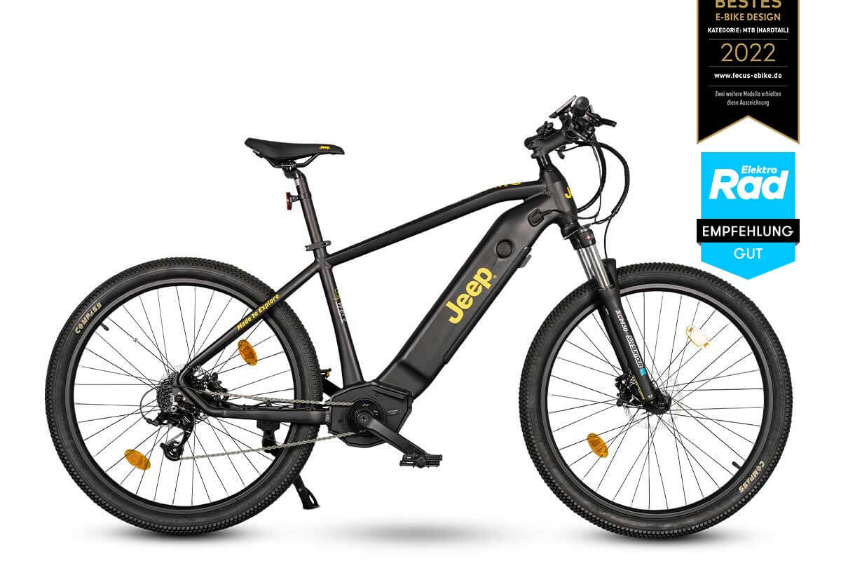 Jeep Mountain E-Bike MHM 7000, Seitenansicht mit geländetauglichen Reifen und robustem Rahmen.