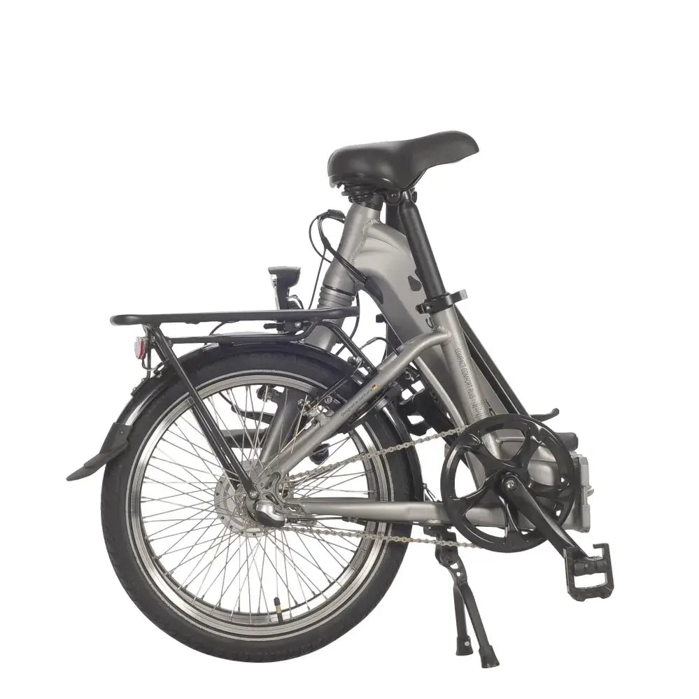 Seitenansicht des Saxonette Compact Comfort Plus 2.0 Falt-E-Bikes mit gefaltetem Rahmen