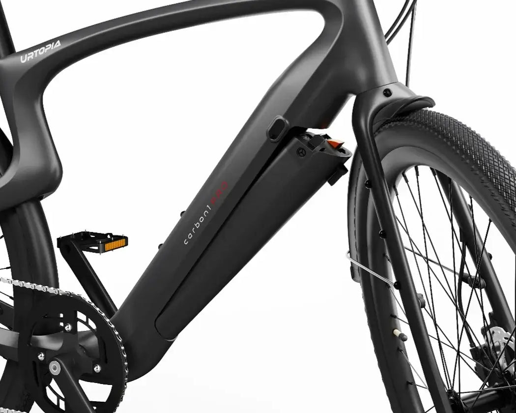 Detailaufnahme des Rahmens und Hinterrads des Urtopia Carbon 1 Pro, mit präzisem Schaltwerk und Scheibenbremse