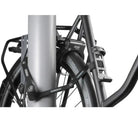 AXA Fold Lite 100 bicycle lock attached to a pole for secure protection.